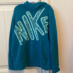 Blue Nike hoodie in a girls medium.